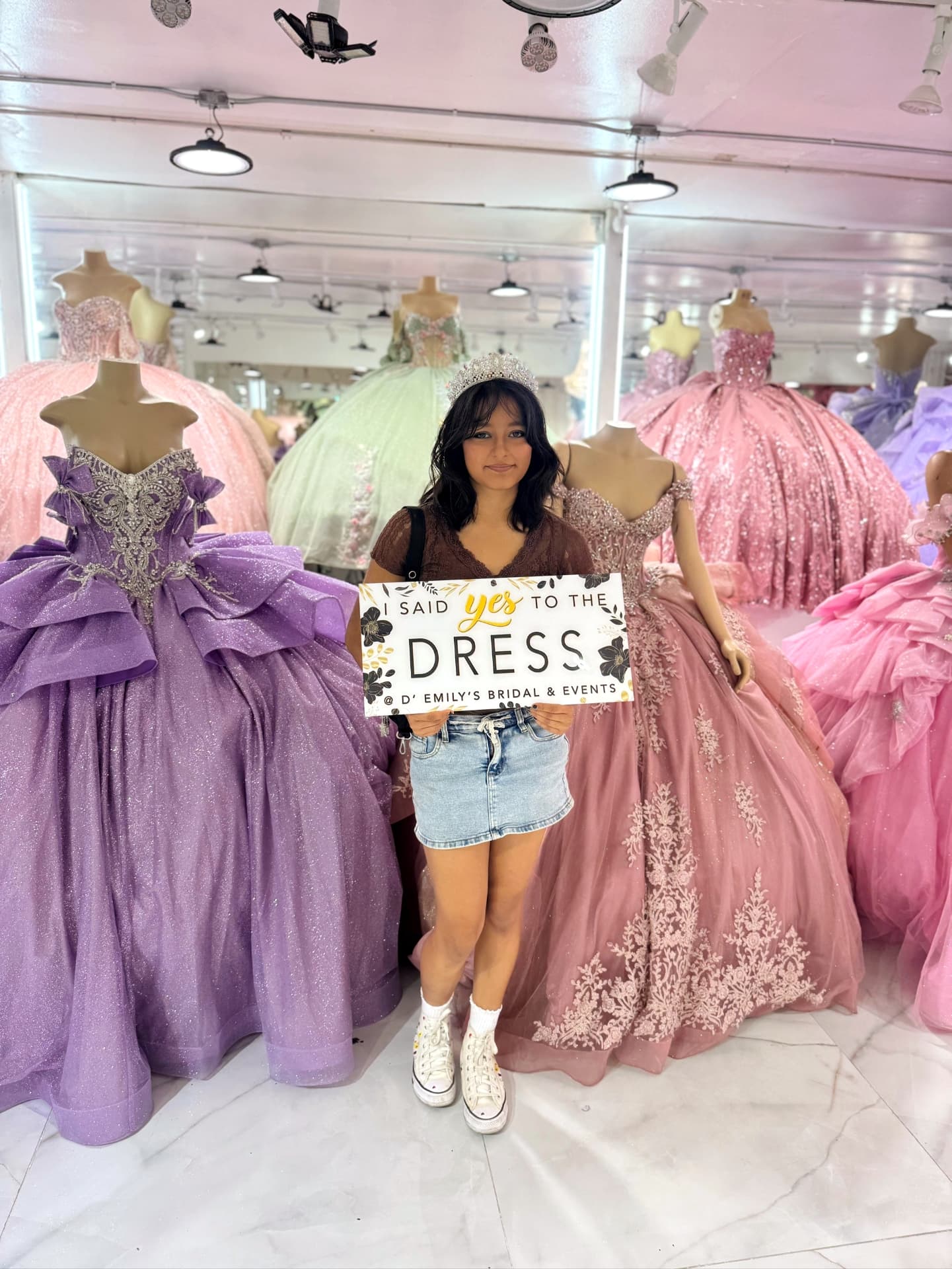 Yvanna holding an 'I said yes to the dress' sign